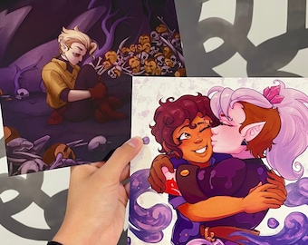 May include: A purple and white illustration of two cartoon characters embracing. The character on the left has brown hair and is wearing a purple and gold outfit. The character on the right has purple hair and is wearing a purple and blue outfit. The background is a light purple with swirls.