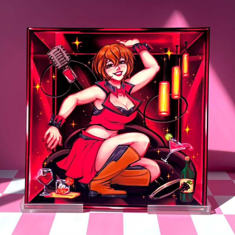 May include: A vibrant illustration of a woman in a red outfit, set against a red backdrop with a microphone and cocktails. The artwork features a dynamic pose, with orange boots and a playful expression. The image is framed in a clear acrylic block.