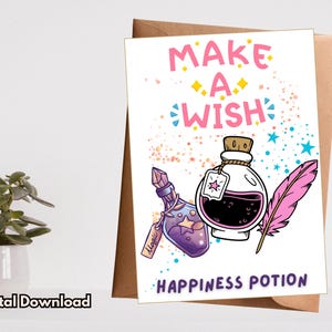 May include: A white card with the text "Make a Wish" and a cartoon illustration of two bottles of potion with a pink feather. The text "Happiness Potion" is at the bottom of the card.