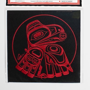 May include: Red embroidered patch with a stylized image of a bird on a black background. The patch is circular and has the text "Golden Top Embroidery Patch" and "Made in Canada" on it.