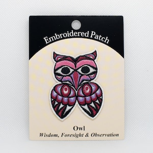 May include: Embroidered patch featuring a pink, purple, and black owl with the text "Embroidered Patch" and "Owl Wisdom, Foresight & Observation".