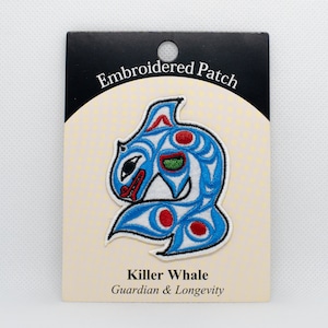 May include: Embroidered patch featuring a blue and white killer whale with red and green accents. The patch is on a white card with the text "Embroidered Patch" and "Killer Whale Guardian & Longevity".