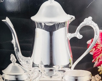 Vintage WM Rogers Silver Plated 5 Piece Tea and Coffee Set and a