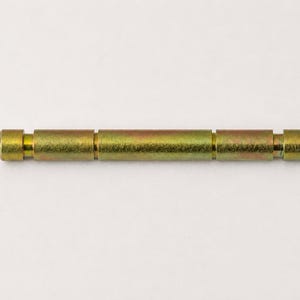 May include: A cylindrical metal pin with a metallic gold-toned finish. The pin features a uniform central section flanked by two distinct grooves on either side, terminating in flat, slightly wider circular ends on both extremities of the object.