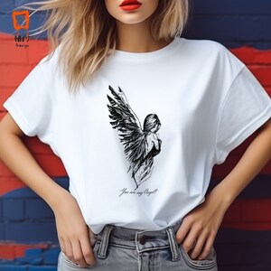 Camiseta con gráfico de alas de ángel: camiseta con frase inspiradora