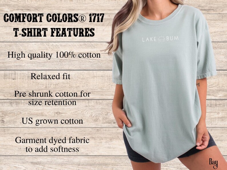 K&ouml;nnte beinhalten: Ein hellgr&uuml;nes Comfort Colors 1717 T-Shirt mit dem Text "LAKE BUM" in Wei&szlig;. Das Shirt hat eine entspannte Passform und besteht aus 100 % Baumwolle. Das Bild zeigt auch die Eigenschaften des T-Shirts.