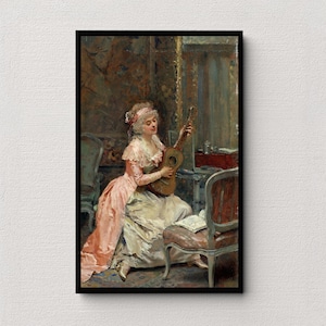 May include: A framed painting depicts a woman in a pink and white dress playing a small, brown guitar. She sits in a room with ornate furniture and a patterned wall. The artwork is a classical portrait, showcasing a moment of musical performance.