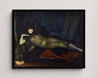 May include: A framed art print depicting a reclining figure with pale skin and dark hair, wearing a black headpiece and intricate dark patterned body covering. The figure rests on a dark surface with red fabric, set against a dark, moody background.