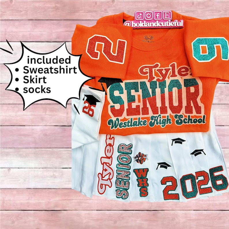 May include: An orange senior year outfit set, including a sweatshirt, skirt, and socks. The set features the name "Tyler", the word "SENIOR", and "Westlake High School" in a mix of orange and teal colors. The skirt has the year "2026".
