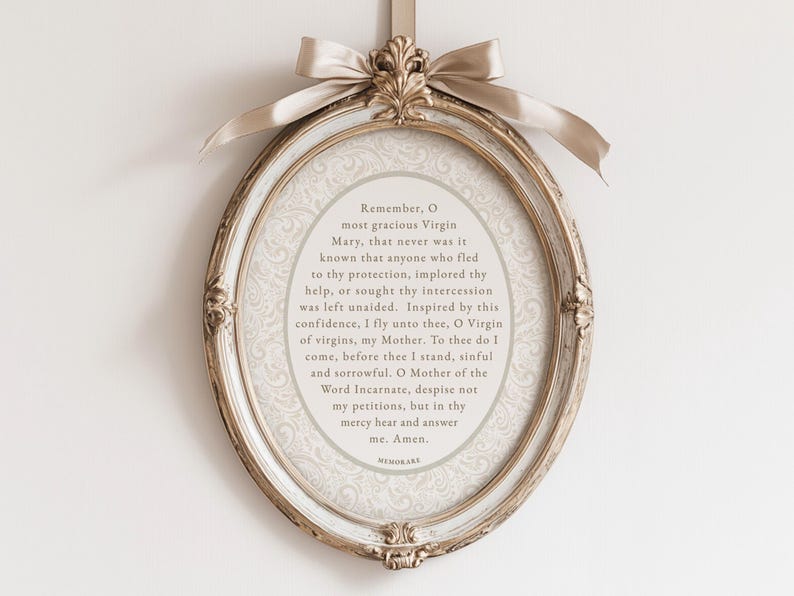 Memorare Prayer printable displayed in an ornate oval gold frame with ribbon bow — elegant Catholic digital download wall art inspired by traditional Marian devotion and vintage design.