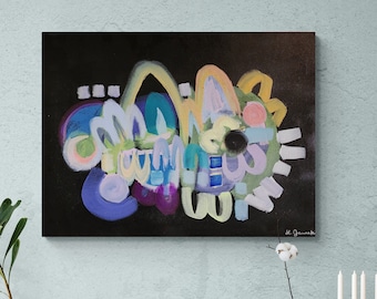 May include: Abstract painting with a black background and colorful shapes in shades of blue, purple, yellow, green, and pink. The painting is framed and hanging on a light blue wall above a wooden cabinet.