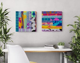 May include: Two abstract paintings with colorful geometric shapes and patterns. The paintings are framed and hung on a white wall.
