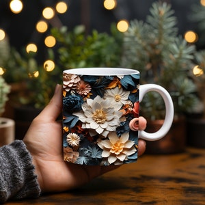 Peut inclure: Une tasse en céramique blanche avec un motif floral coloré. Le motif présente une variété de fleurs dans des tons de blanc, rose, orange et bleu, avec des feuilles vertes. Les fleurs sont disposées en couches, dans un style tridimensionnel, donnant à la tasse un aspect unique et artistique.