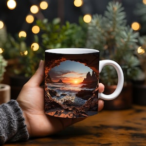 May include: White ceramic mug with a scenic image of a rocky coastline and ocean at sunset. The image is framed by a broken, weathered stone wall.