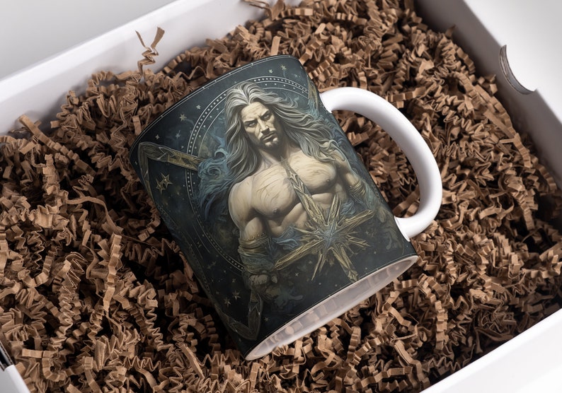 May include: A white ceramic mug with a black and blue design featuring a man with long white hair and a beard. The design includes stars and a large starburst.
