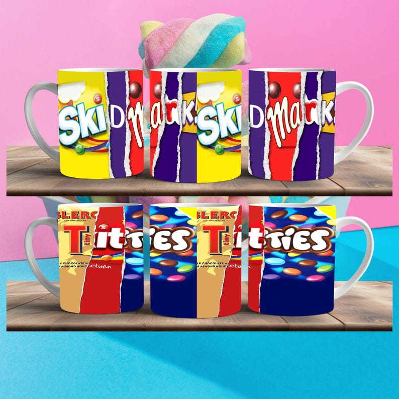 May include: Six white ceramic mugs with colorful candy bar wrappers printed on them. The mugs feature the logos of Skittles and  Tiny  Turtles candy bars.
