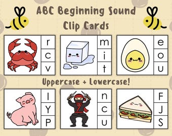 May include: Educational ABC Beginning Sound Clip Cards with illustrations of a crab, ice cube, egg, pig, ninja, and sandwich. Each card shows a letter and image, for uppercase and lowercase learning.