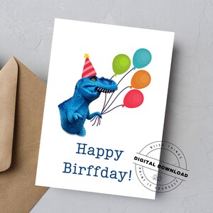 May include: A birthday card featuring a blue dinosaur wearing a party hat and holding colorful balloons. The card reads "Happy Birffday!" in dark blue text. A digital download stamp is in the corner.