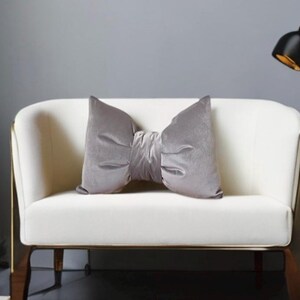 Hand crafted grey velvet bow pillow