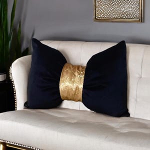 elegant luxurious  gold and black  velvet  bow  pillow