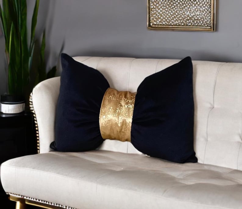 elegant luxurious  gold and black  velvet  bow  pillow