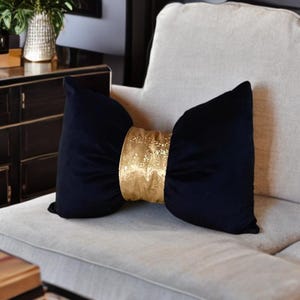 Handcrafted velvet gold and  black bow pillow