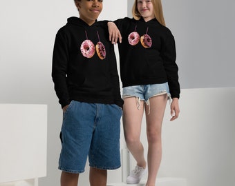 Youth heavy blend hoodie Brown and pink donuts, bitten from the end