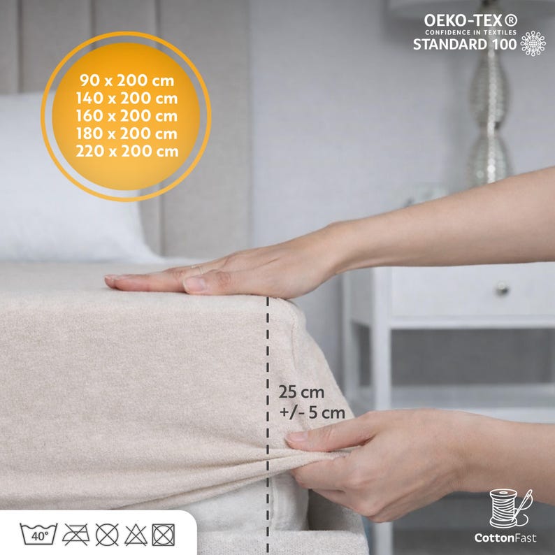 May include: Beige fitted sheet with dimensions listed: 90 x 200 cm, 140 x 200 cm, 160 x 200 cm, 180 x 200 cm, and 220 x 200 cm. The sheet depth is 25 cm (+/- 5 cm). The sheet is OEKO-TEX Standard 100 and CottonFast.
