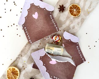 Kleurrijke printbare sjabloon voor een geldcadeau-idee voor Kerstmis of Sinterklaas. Verpakkingstip voor een klein kerstcadeau. PDF met aquarel.