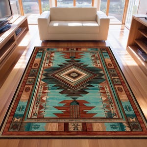 May include: Rectangular area rug with a Southwestern design. The rug features a turquoise, brown, and rust color palette with geometric patterns. A large diamond shape is in the center, surrounded by tribal motifs and a wooden border.