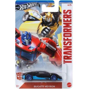 May include: A Hot Wheels Transformers die-cast toy car, a blue Bugatti Veyron, on a red, white, and blue card with a picture of Optimus Prime and Bumblebee. The card says "Transformers" and "Bugatti Veyron".