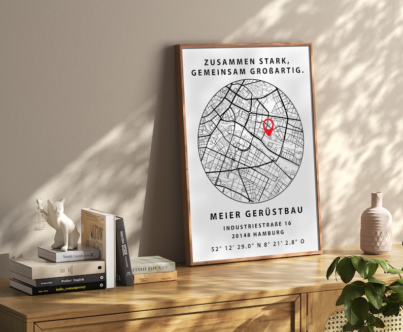 May include: Black and white poster with a map of a city and the text "Zusammen stark, gemeinsam gro&szlig;artig."  The poster also includes the text "Meier Ger&uuml;stbau", "Industriestra&szlig;e 16", "20148 Hamburg", and "52&deg; 12' 29.0" N 8&deg; 21' 2.8" O".