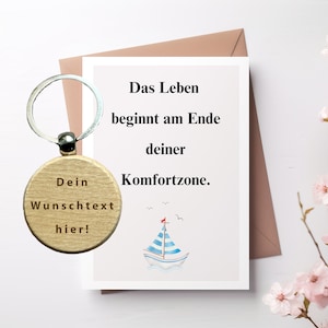 Kaart "Het leven begint aan het einde van je comfortzone" met gepersonaliseerd sleutelhangerhout, aanmoediging, nieuwe paden en uitdagingen