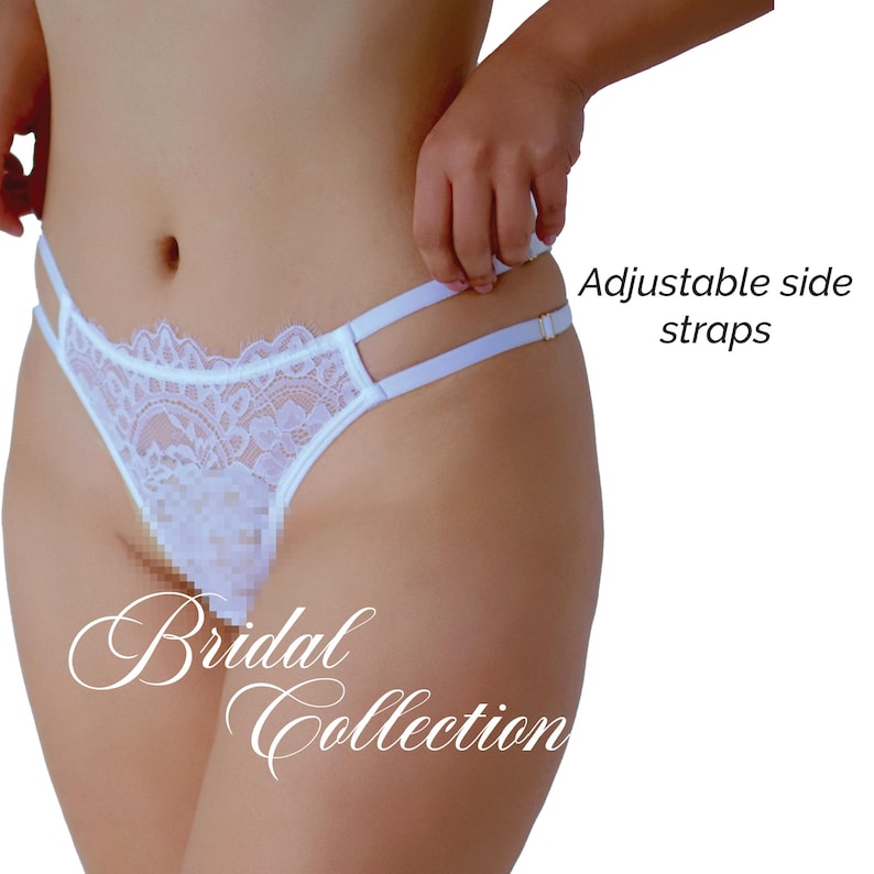 May include: White lace thong with adjustable side straps. The front features a delicate floral lace design. The text "Bridal Collection" is displayed in a cursive font.