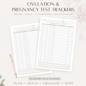 May include: Two white paper sheets featuring Ovulation and Pregnancy Test Trackers with grid layouts for recording dates and results. The text reads Ovulation Tracker and Pregnancy Tracker. A gold pen is positioned next to the documents.