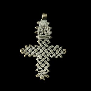 Ethiopian Cross in white metal with a woven design
