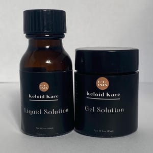 May include: Two black bottles of Keloid Kare products. One is a brown glass bottle labeled "Liquid Solution" and the other is a black jar labeled "Gel Solution". Both have black lids and the text "Net 0.5 oz (15ml)".