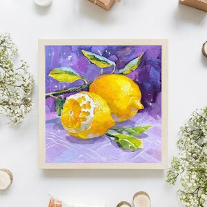 May include: A painting of two lemons with green leaves on a purple background. The lemons are yellow and have a textured surface. The painting is framed in a light wood frame.