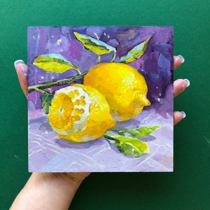 May include: Two yellow lemons with green leaves on a purple background. The lemons are painted in a realistic style with visible brushstrokes.