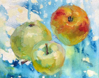 May include: Three apples on a blue and white background. One apple is red and yellow, and the other two are green.