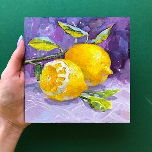May include: Two yellow lemons with green leaves on a purple background. The lemons are painted in a realistic style with visible brushstrokes.