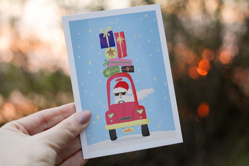 Carte de noël le père noël en voiture image 1