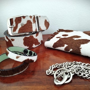Belt and wallet and bracelet in spotted leather with ponyskin finish in shortenable gift box unisex gift in ecopack box