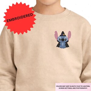 Embroidered character on a sweater