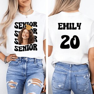 a woman wearing a t - shirt that says senior senior senior senior senior senior senior