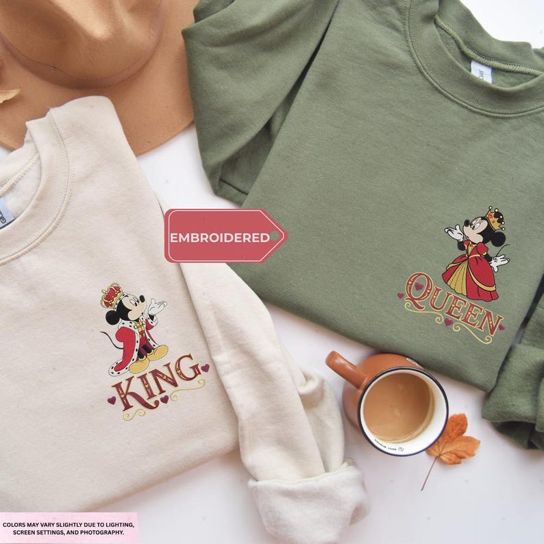 two t-shirts with a Disney character design, a cup of coffee, and a leaf, all laid out on a white surface.