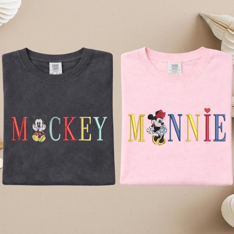two t-shirts with the word "MICKEY" and the character Minnie Mouse printed on them.