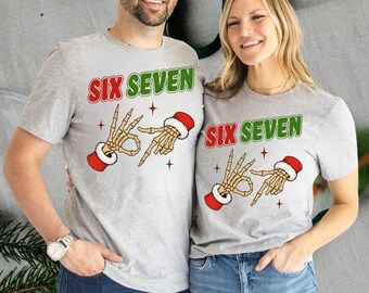 6 7 Santa Skeleton Hand Shirt, Funny Christmas Meme Tee, Six Seven TikTok Viral Trend Sweatshirt, Gen Z Christmas Hoodie