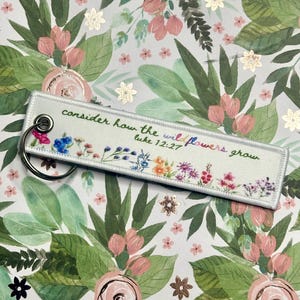 Luke 12:27 Wildflower Keychain – Cute Christian Gift, Double-Sided Floral Design