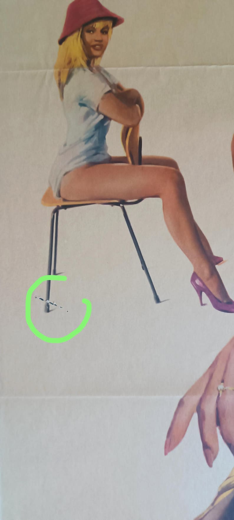 May include: Vintage poster art featuring a woman in a light blue top and red hat, seated on a wooden chair with black legs. The image has a retro aesthetic, with a focus on the woman's pose and attire.